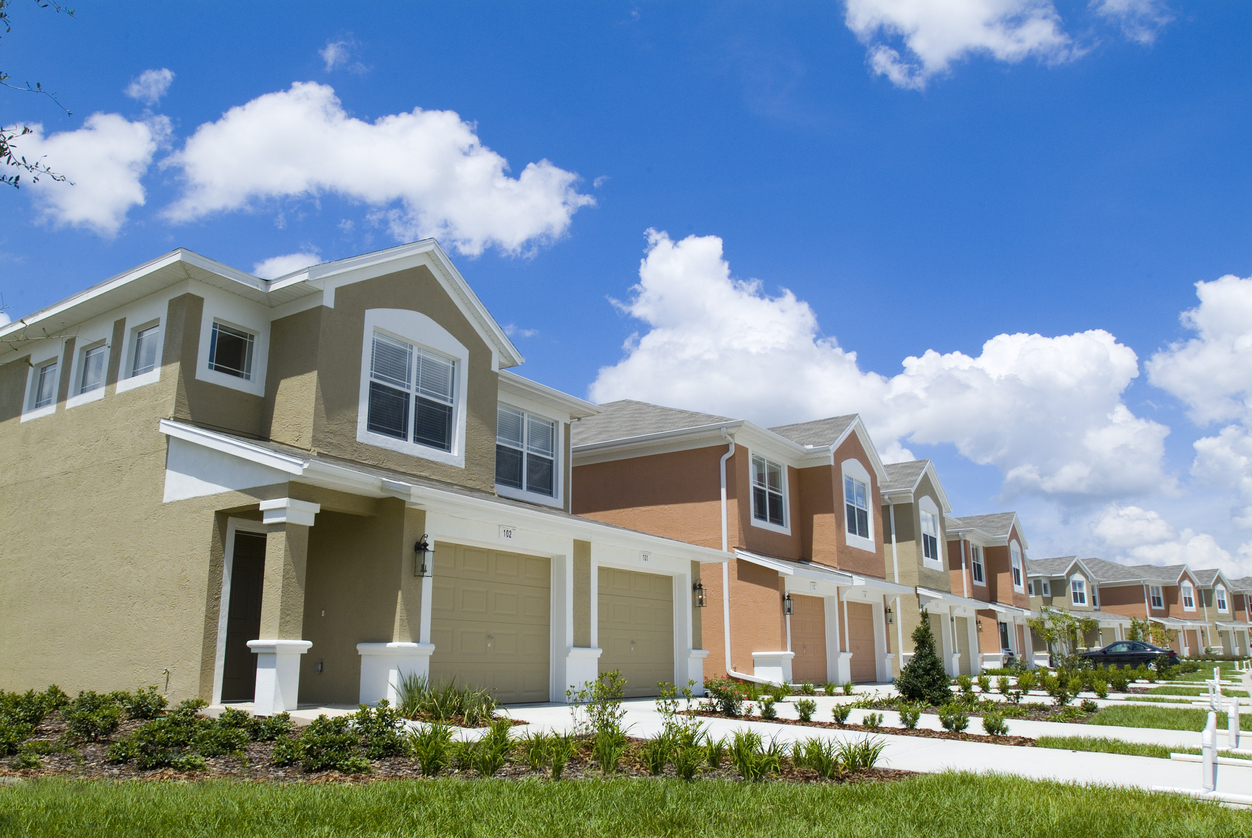 Photos of single family homes next to each other