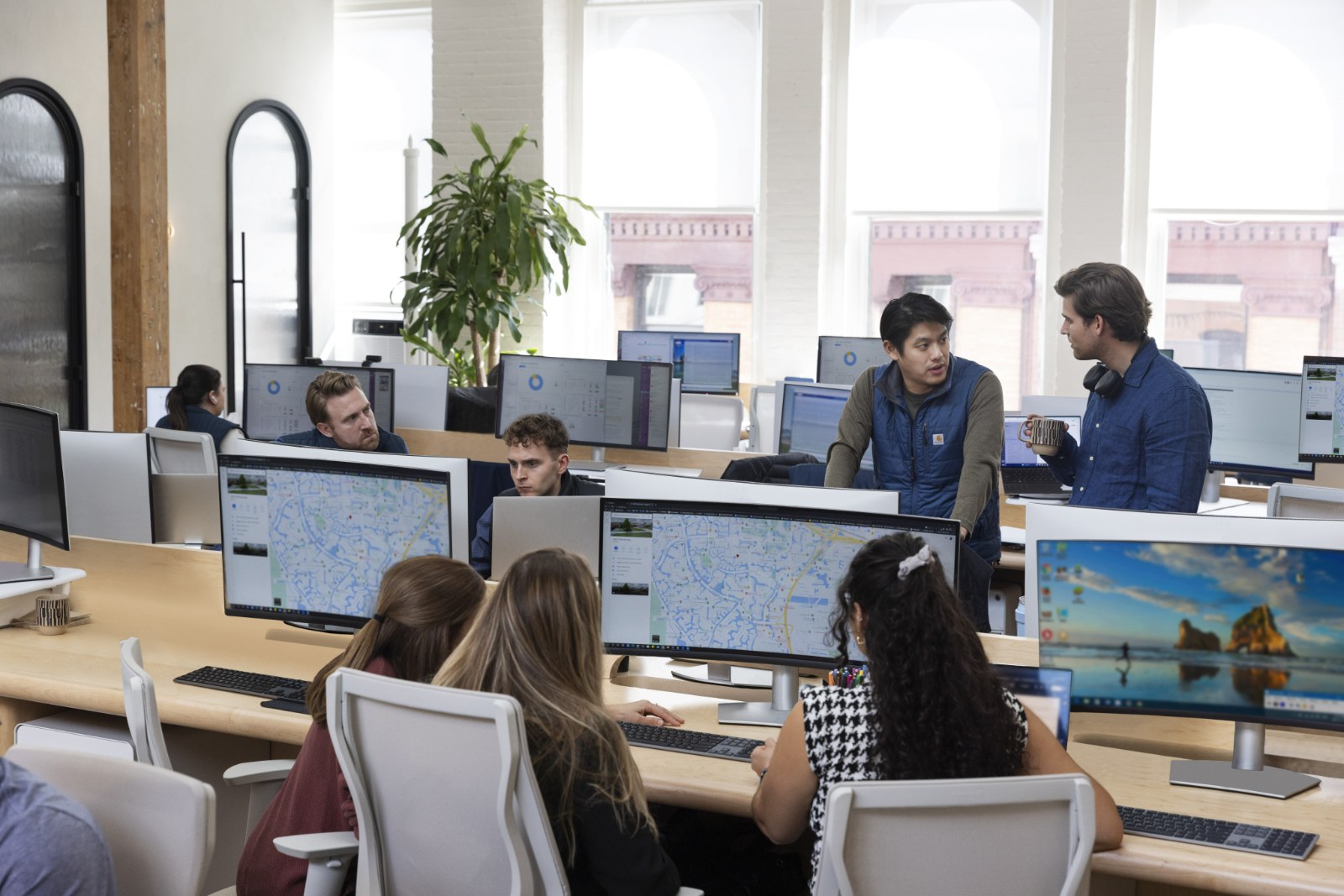 The Avenue One team reviewing market maps